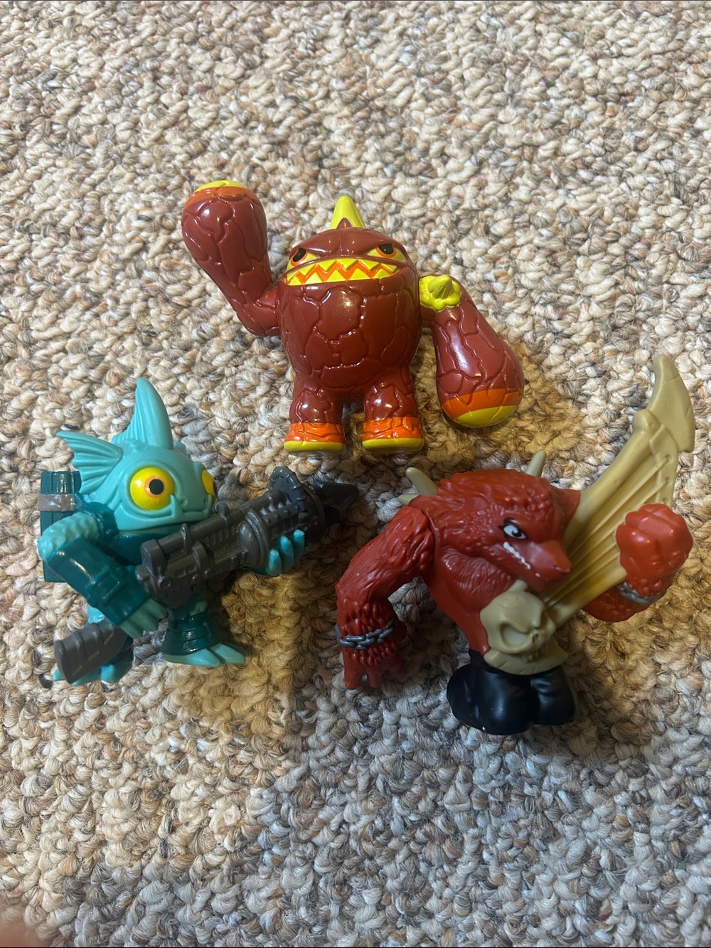 Skylanders Figure Bundle – Red Monster, Teal Fish Soldier, Brown Winged Beast
